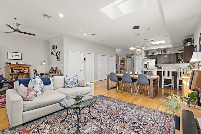 204 Jackson St Unit 9, Hoboken, NJ 07030 - living area featuring a skylight, light wood finished floors, ceiling fan, and recessed lighting