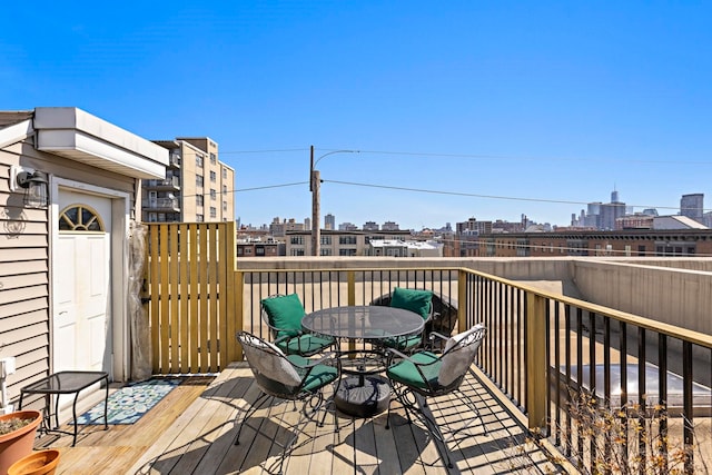 204 Jackson St Unit 9, Hoboken, NJ 07030 - deck featuring a skyline view and outdoor dining area