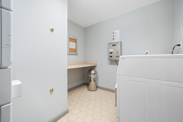 bathroom featuring washer / clothes dryer