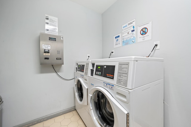 laundry room with separate washer and dryer