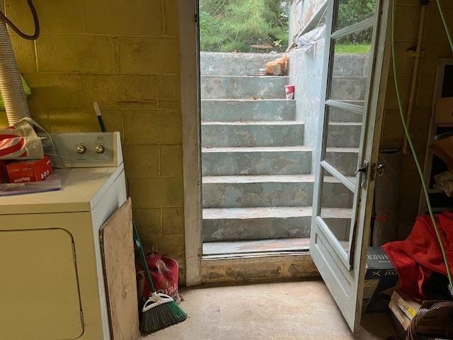 18 Messler St, East Brunswick, NJ 08816 - stairway with washer / clothes dryer, concrete flooring, concrete block wall, and plenty of natural light