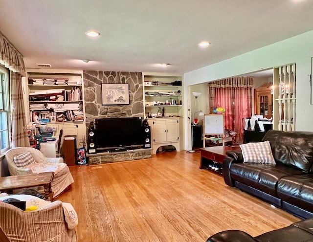 18 Messler St, East Brunswick, NJ 08816 - living area with wood finished floors, built in features, and recessed lighting