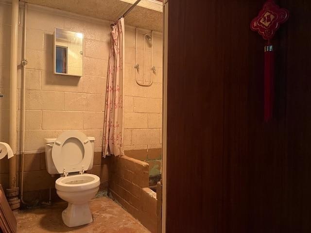 18 Messler St, East Brunswick, NJ 08816 - bathroom featuring unfinished concrete floors and shower / bathtub combination with curtain