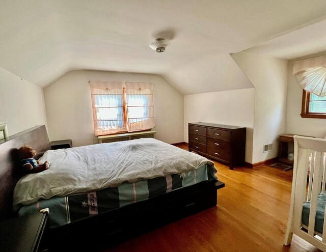 18 Messler St, East Brunswick, NJ 08816 - bedroom featuring wood finished floors and vaulted ceiling