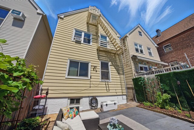 152 W 30th St, Bayonne, NJ 07002 - multi unit property with a garage, driveway, and brick siding
