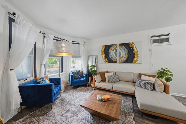 152 W 30th St, Bayonne, NJ 07002 - living room featuring wood finished floors and a wall mounted air conditioner