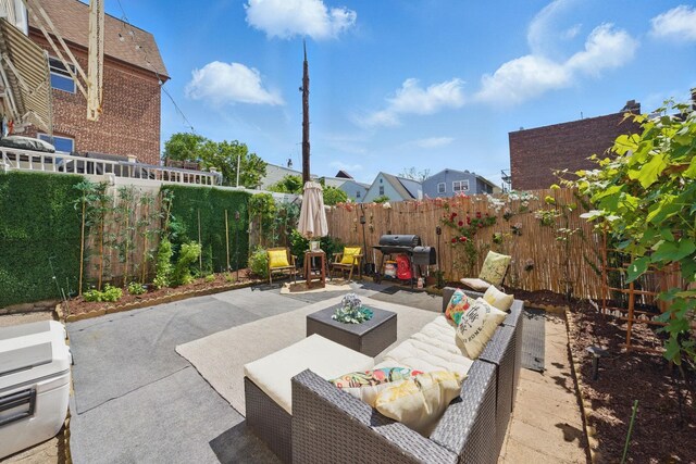 152 W 30th St, Bayonne, NJ 07002 - back of house featuring a patio area and outdoor lounge area
