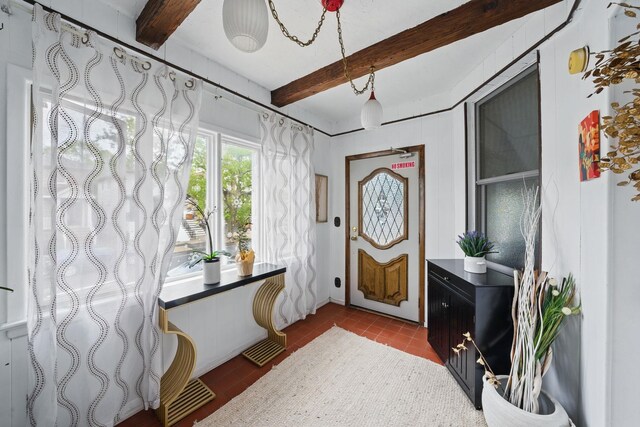 152 W 30th St, Bayonne, NJ 07002 - foyer with beamed ceiling and tile patterned floors