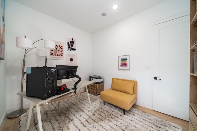 sitting room with hardwood / wood-style floors