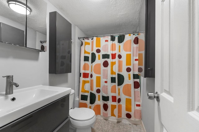 11 Cuneo Pl Unit D, Jersey City, NJ 07307 - bathroom featuring a textured ceiling, vanity, curtained shower, toilet, and tile patterned flooring