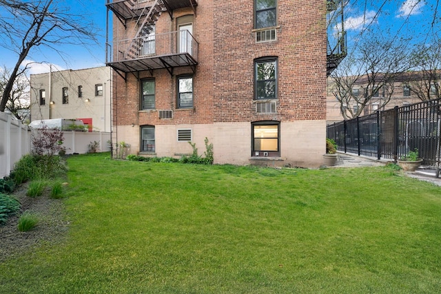 11 Cuneo Pl Unit D, Jersey City, NJ 07307 - rear view of property with brick siding and a balcony