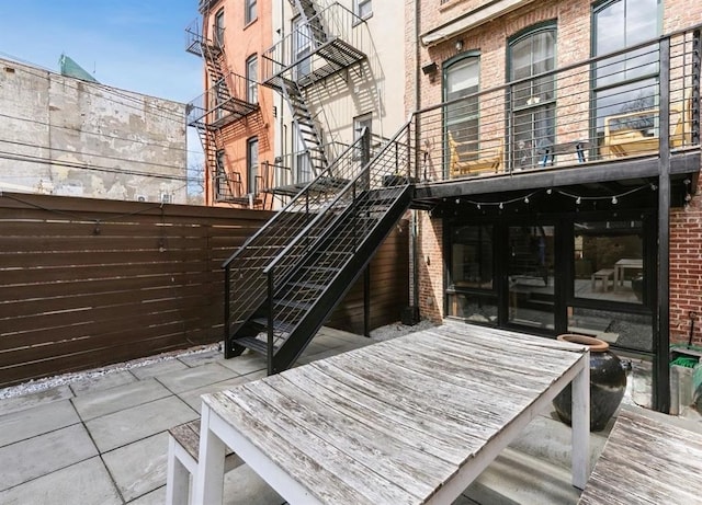225 8th St, Jersey City, NJ 07302 - wooden terrace with stairs and a patio