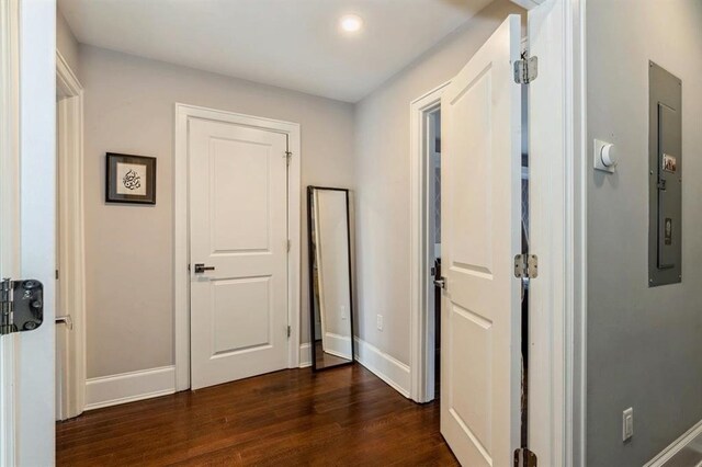 225 8th St, Jersey City, NJ 07302 - corridor with dark wood finished floors and baseboards