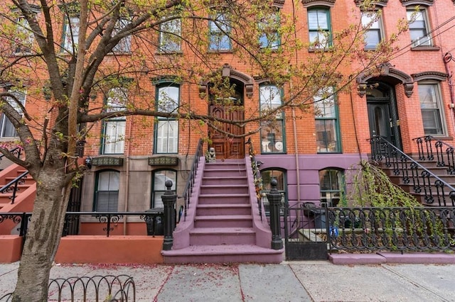 225 8th St, Jersey City, NJ 07302 - view of property featuring stairway