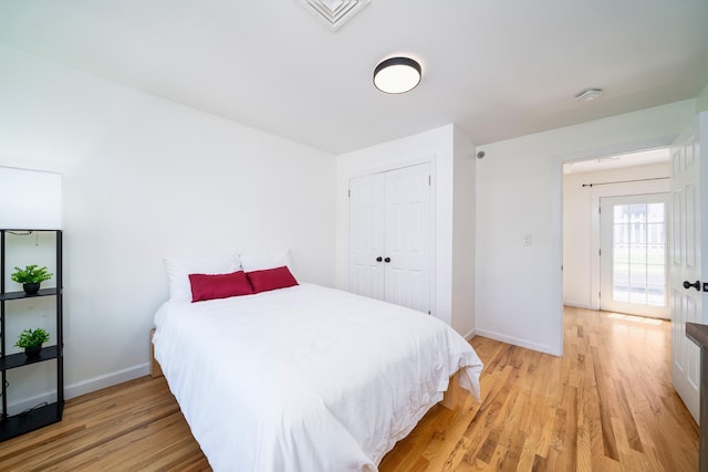 110 Morris St Unit 3R, Jersey City, NJ 07302 - bedroom featuring light wood-style floors, baseboards, and a closet