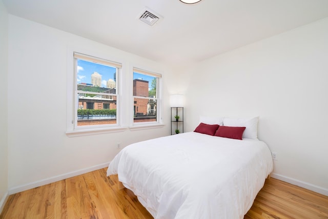 110 Morris St Unit 3R, Jersey City, NJ 07302 - bedroom featuring wood finished floors and baseboards