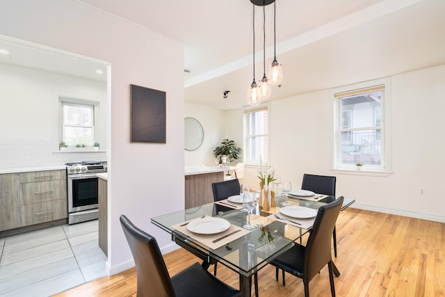 110 Morris St Unit 3R, Jersey City, NJ 07302 - dining space with light wood-type flooring and baseboards