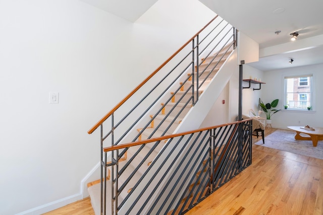 110 Morris St Unit 3R, Jersey City, NJ 07302 - stairs with wood finished floors and baseboards