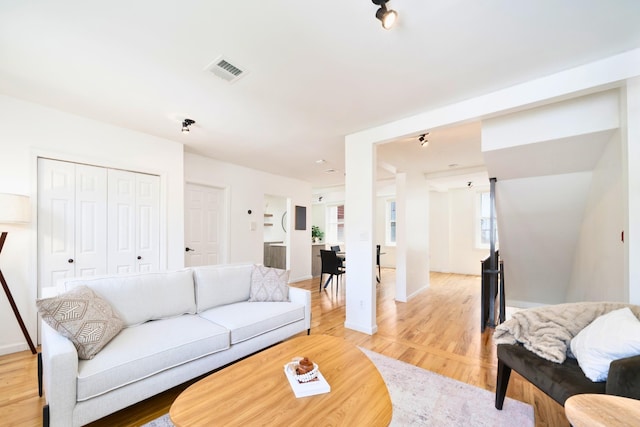 110 Morris St Unit 3R, Jersey City, NJ 07302 - living room with light wood finished floors, healthy amount of natural light, and baseboards