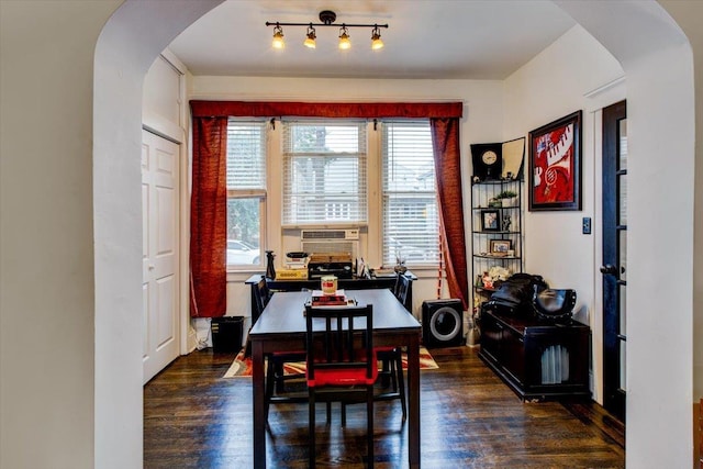 8212 2nd Ave, North Bergen, NJ 07047 - dining room featuring arched walkways, healthy amount of natural light, and wood finished floors