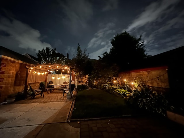 8212 2nd Ave, North Bergen, NJ 07047 - patio at twilight featuring a patio area and a pergola