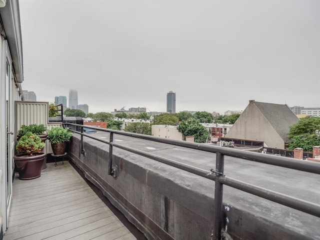 balcony featuring a view of city