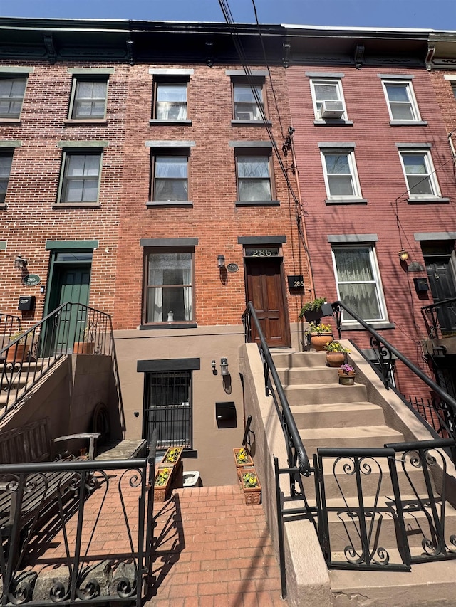 exterior space with brick siding