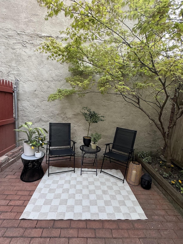 view of patio with fence