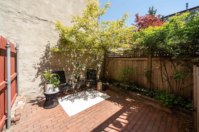 view of patio / terrace with fence