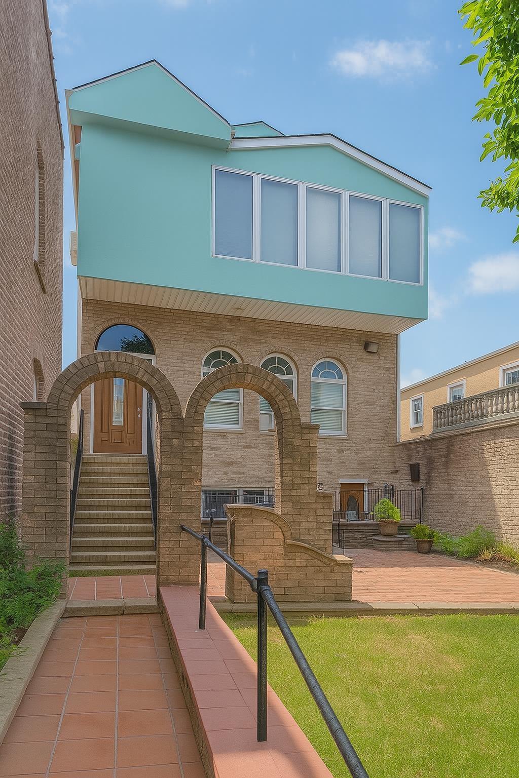 199 20th St, Union City, NJ 07087 - view of front of home with brick siding