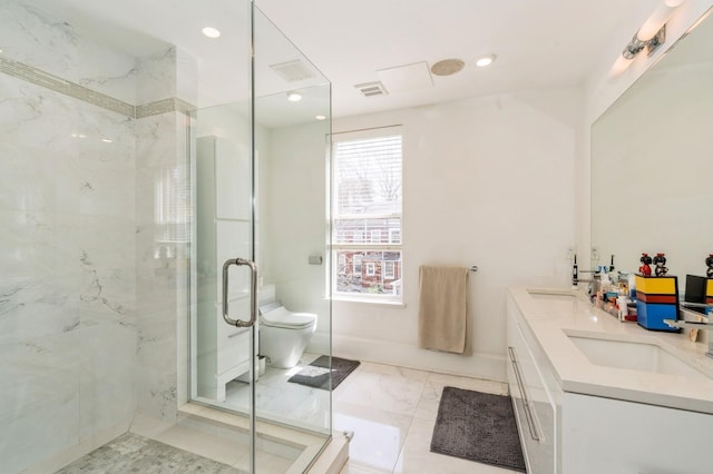 bathroom with visible vents, double vanity, marble finish floor, toilet, and a shower stall