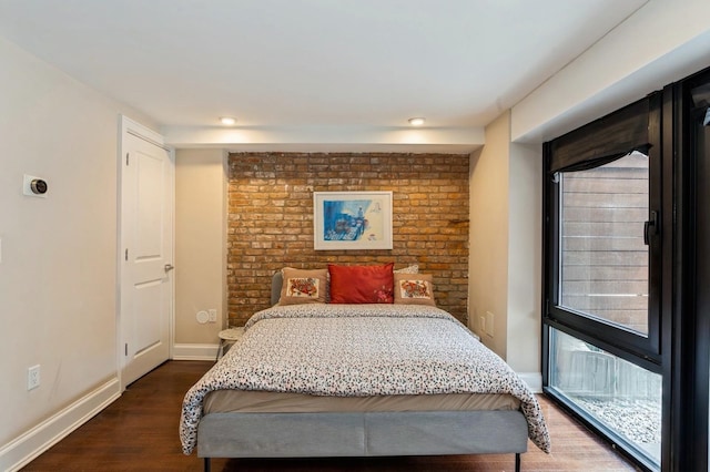 bedroom with recessed lighting, baseboards, and dark wood-style floors