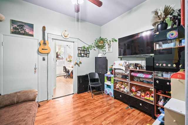 213 45th St, Union City, NJ 07087 - game room featuring wood finished floors and a ceiling fan