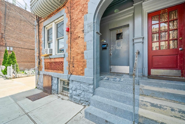 213 45th St, Union City, NJ 07087 - doorway to property with a porch and brick siding
