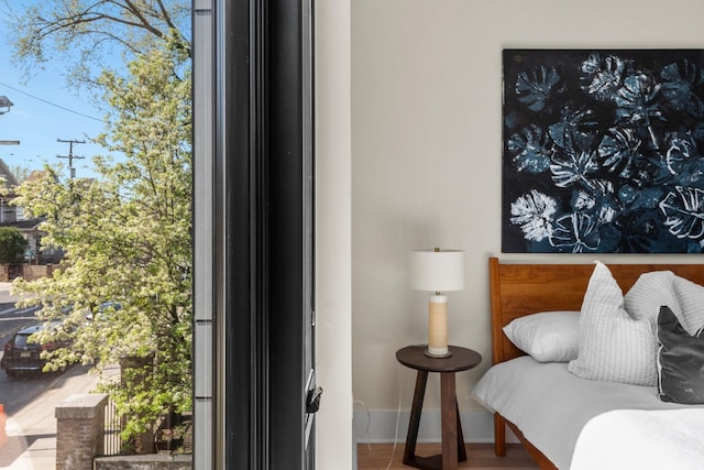 bedroom featuring baseboards