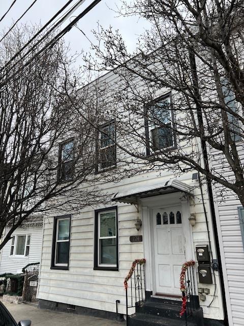 124 71st St, Guttenberg, NJ 07093 - view of front of home with entry steps