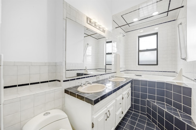 301 79th St Unit E4, North Bergen, NJ 07047 - full bathroom with tile walls, tiled shower / bath combo, double vanity, tile patterned floors, and toilet