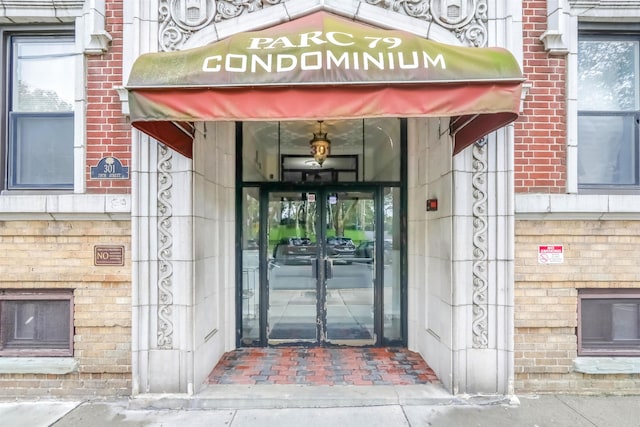 301 79th St Unit E4, North Bergen, NJ 07047 - entrance to property featuring french doors and brick siding