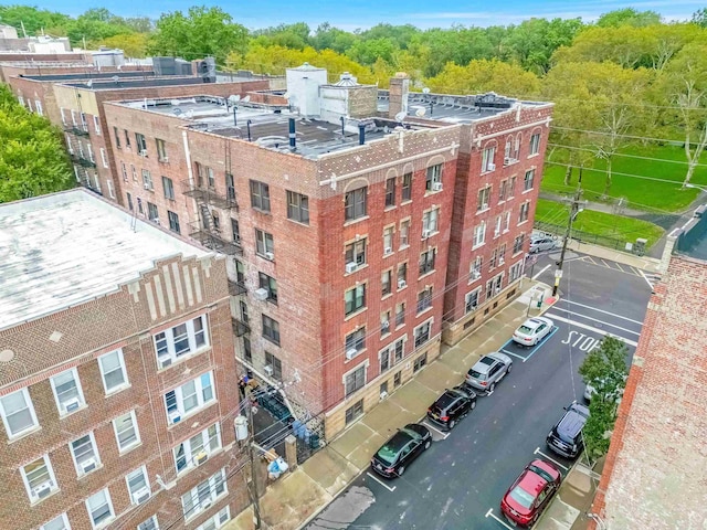301 79th St Unit E4, North Bergen, NJ 07047 - view of apartment building / complex with uncovered parking and central AC