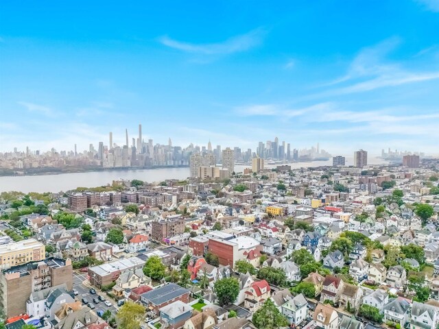 301 79th St Unit E4, North Bergen, NJ 07047 - aerial overview of property's location featuring a view of skyline and a nearby body of water