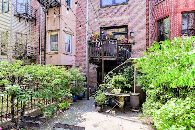 doorway to property with brick siding