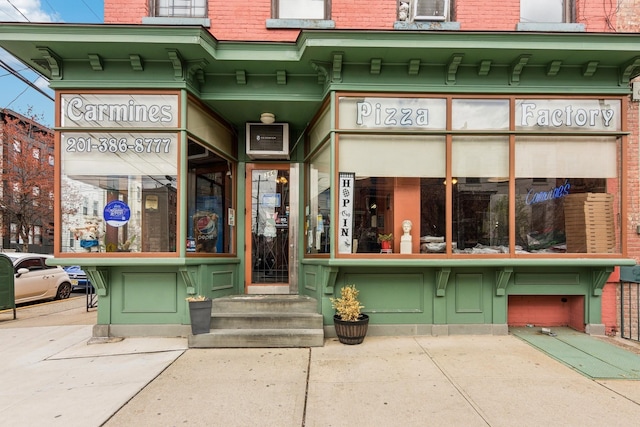 366 8th St, Jersey City, NJ 07302 - view of exterior entry featuring brick siding