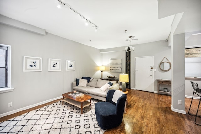 227 Christopher Columbus Dr Unit B-234, Jersey City, NJ 07302 - living area with wood finished floors and rail lighting