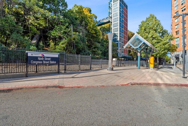 view of road with curbs and sidewalks