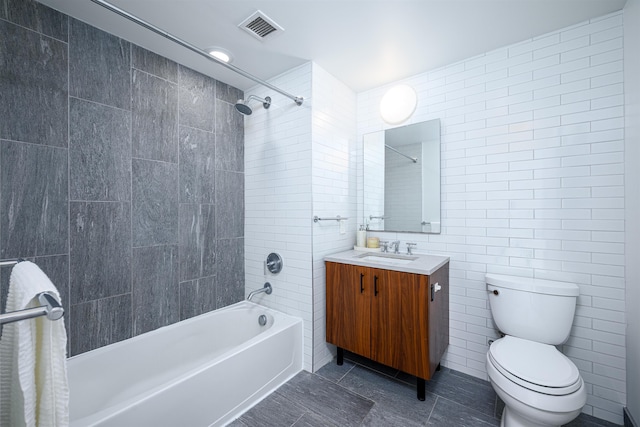 10 Provost St Unit 2405, Jersey City, NJ 07302 - bathroom with tile walls, shower / washtub combination, vanity, and tile patterned floors