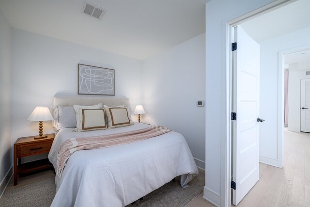 10 Provost St Unit 2405, Jersey City, NJ 07302 - bedroom featuring baseboards and light wood-type flooring