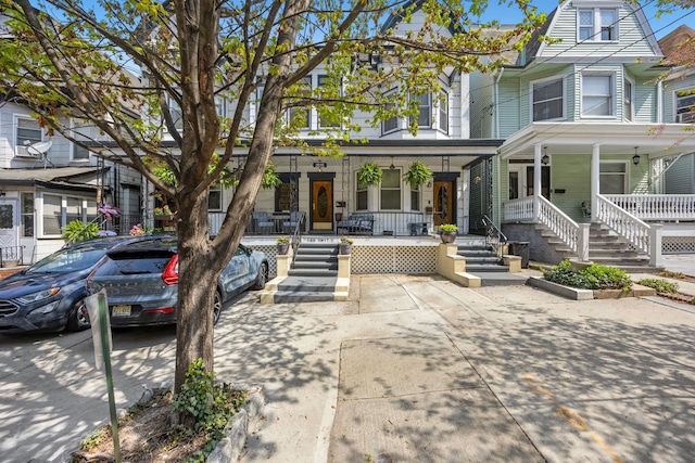 138 Kensington Ave Unit 3-A, Jersey City, NJ 07304 - view of property featuring a porch