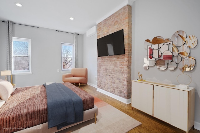 bedroom featuring wood-type flooring