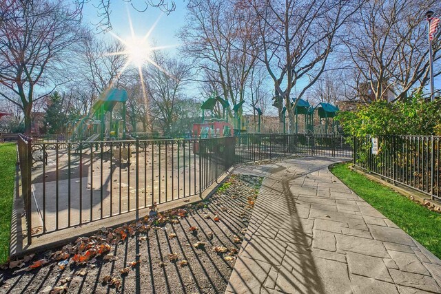 view of home's community featuring a playground