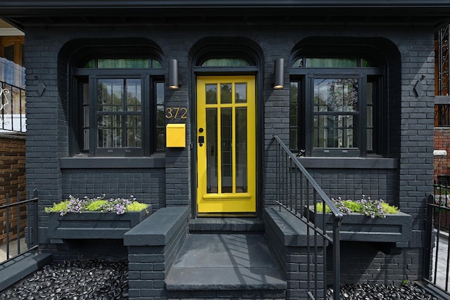 372 Webster Ave, Jersey City, NJ 07307 - property entrance with brick siding and a porch
